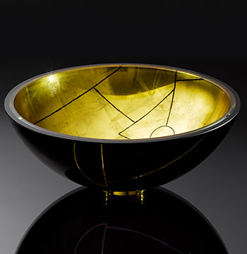 Vessel sink of black and gold etched glass